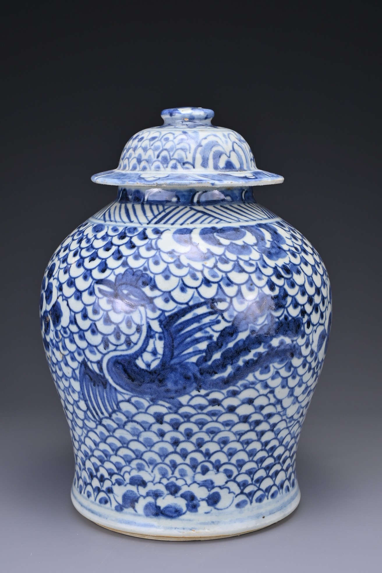 A CHINESE BLUE AND WHITE PORCELAIN PHOENIX JAR AND COVER, 18TH CENTURY. Covered in a scale pattern - Image 5 of 9