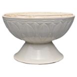 A CHINESE DING-TYPE LOTUS BOWL. The bowl with overlapping lotus lappets on a fluted stem base