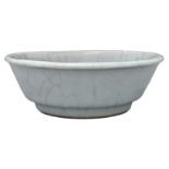 A CHINESE GUAN-TYPE GLAZED BOWL. With straight sides on a slightly tapered foot with everted rim.