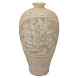 A CHINESE CIZHOU-TYPE SGRAFFIATO MEIPING. White-glazed carved in relief with bands of floral