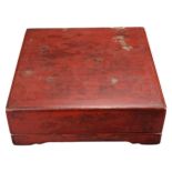 A LARGE CHINESE RED LACQUER TRAY BOX AND COVER, EARLY 20TH CENTURY. Of square form on four legs with