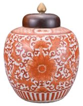 A CHINESE IRON-RED PORCELAIN GINGER JAR AND COVER, 19TH CENTURY. Decorated with bats and flowers