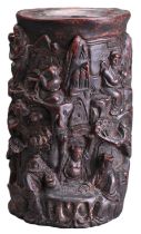 A CARVED WOODEN BRUSH POT WITH 'EUROPEAN FIGURE'. Carved in deep relief with various figures on