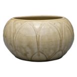 A CHINESE YAOZHOU TYPE LOTUS BOWL. The globular squat body with carved lotus lappet design covered