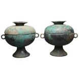 PAIR OF CHINESE BRONZE ROUND VESSELS AND COVERS, DOU, WARRING STATES PERIOD (471-225BC). Each with