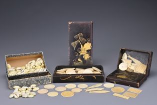 THREE BOXES OF COWRIE SHELL AND BONE GAMING COUNTERS. To include two Japanese lacquer and gilt boxes