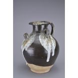 A CHINESE PHOSPHATIC SPLASHED BOWN GLAZED JAR