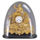 A FRENCH GILT METAL MANTEL CLOCK IN GLASS DOME, 19TH CENTURY