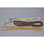 A GGROUP OF FOUR BEADED NECKLACES