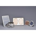 GROUP OF SILVER HALLMARKED PICTURE FRAMES AND GLASS POWDER BOWL
