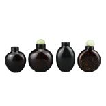 FOUR CHINESE GLASS SNUFF BOTTLES. To include three aventurine glass bottles, with gold / bronze