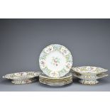 19TH CENTURY NINE PIECE PORCELAIN SERVICE. With six plates, two circular standing plates and one