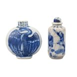 TWO CHINESE BLUE AND WHITE PORCELAIN SNUFF BOTTLES, 19TH CENTURY. To include a flattened ovoid