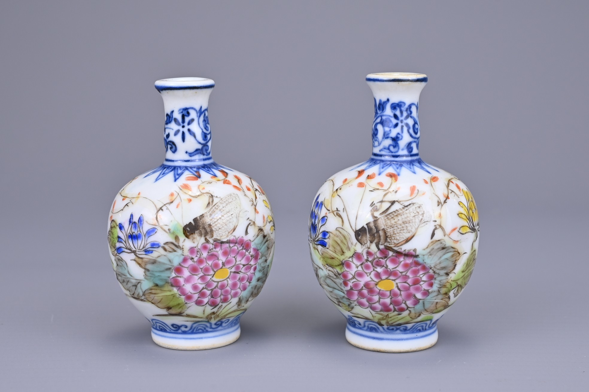 A PAIR OF CHINESE MINIATURE PORCELAIN VASES, REPUBLIC PERIOD. Each decorated in underglaze blue