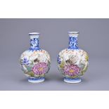 A PAIR OF CHINESE MINIATURE PORCELAIN VASES, REPUBLIC PERIOD. Each decorated in underglaze blue