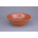 A BURMESE CERAMIC BOWL, PROBABLY 15TH CENTURY. With rounded body and everted rim