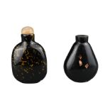 TWO CHINESE GLASS SNUFF BOTTLES. To include an aventurine glass bottle with gold flecks and stone