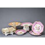 GROUP OF SEVEN VICTORIAN CERAMIC ITEMS to include: tazza with pedestal decorated with putti figures;