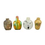 FOUR CHINESE SNUFF BOTTLES. Comprising a polychrome glazed ceramic bottle with carnelian stopper;
