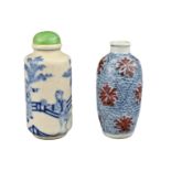 TWO CHINESE PORCELAIN SNUFF BOTTLES, 19TH CENTURY. To include a cylindrical bottle decorated in blue