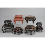 A GROUP OF CHINESE / JAPANESE CARVED WOOD AND LACQUER DISPLAY STANDS. Each of various shapes and
