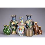 GROUP OF SEVEN CHINESE CLOISONNE VASES AND WARMING POT. Cloisonne vases with floral decoration,