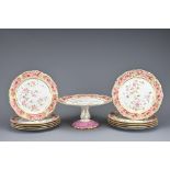 VICTORIAN PORCELAIN DESSERT SERVICE, including tazza and ten plates painted with flowers and gilt
