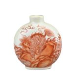 A CHINESE PORCELAIN SNUFF BOTTLE, 18/19TH CENTURY. Of flattened ovoid form decorated in iron-red