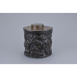A CHINESE HARDWOOD ZITAN TEA CADDY 19/20TH CENTURY. Of cylindrical form carved in relief