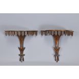 A PAIR OF CARVED HARDWOOD WALL BRACKETS, SCONCES. Fluted support under a semi circle platform with