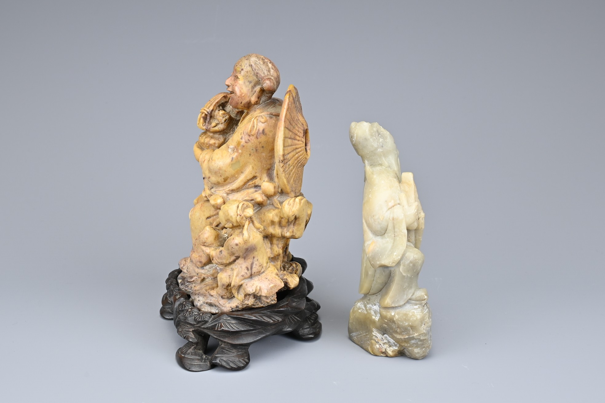 TWO CHINESE SOAPSTONE CARVINGS OF IMMORTALS, EARLY 20TH CENTURY. To include a carved figure of Lan - Image 4 of 5