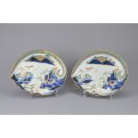 A PAIR OF JAPANESE ARITA PORCELAIN DISHES, 18/19TH CENTURY. Abalone shell form decorated with