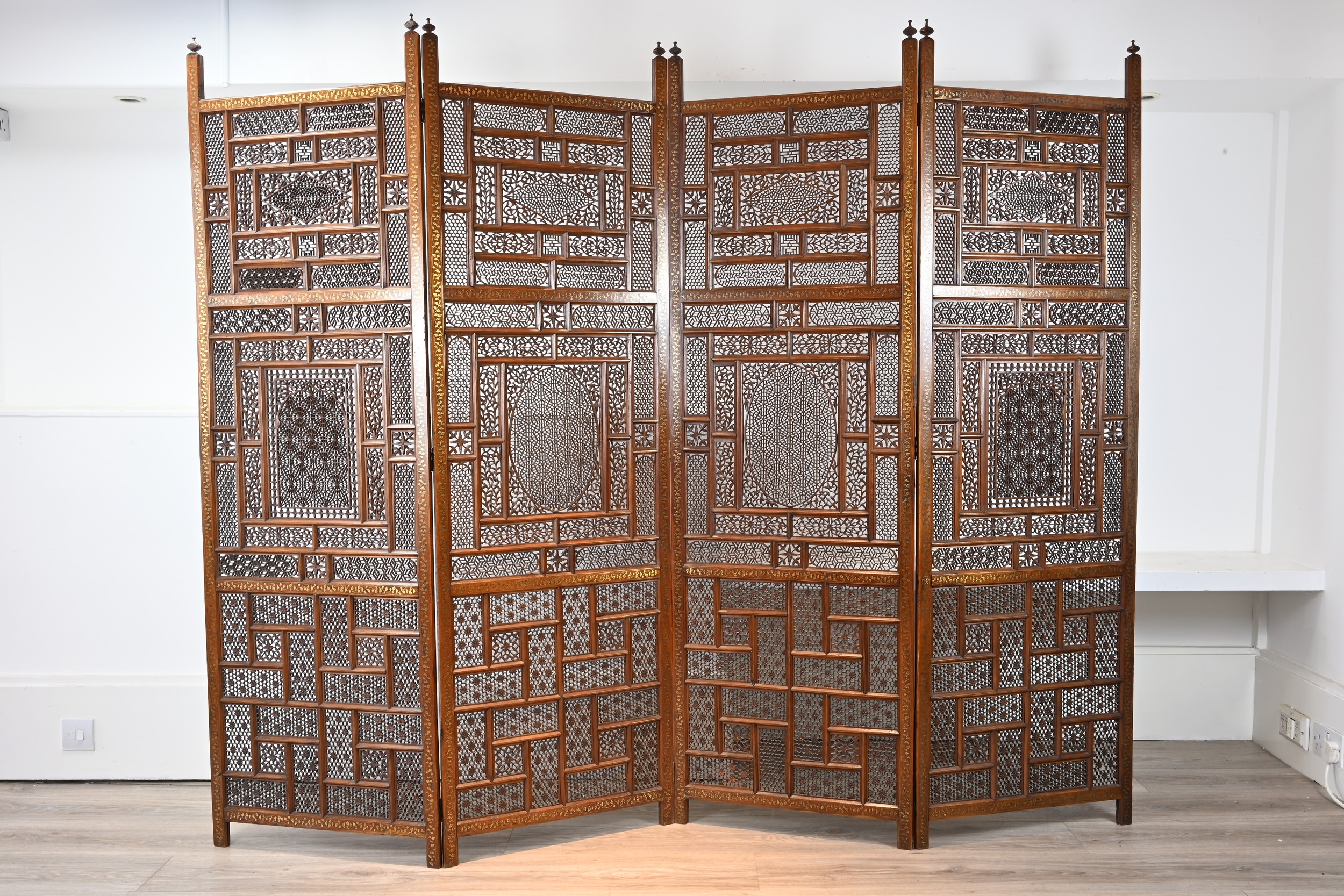 AN INDIAN FOUR PANEL TEAK WOOD AND BRASS INLAID SCREEN, 19TH CENTURY. Brass inlaid decoration to - Image 4 of 8