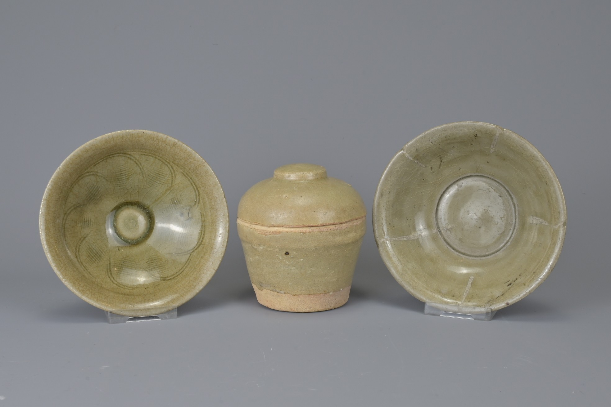 THREE CHINESE CELADON ITEMS, SONG DYNASTY. To include a Yaozhou tea bowl with floral medallion to