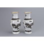 A PAIR OF CHINESE CRACKLE GLAZED BALUSTER VASES, 20TH CENTURY. Each moulded in high relief with