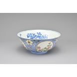 A CHINESE FAMILLE ROSE SGRAFFITO PALE BLUE-GROUND MEDALLION BOWL, 19/20TH CENTURY. Decorated to