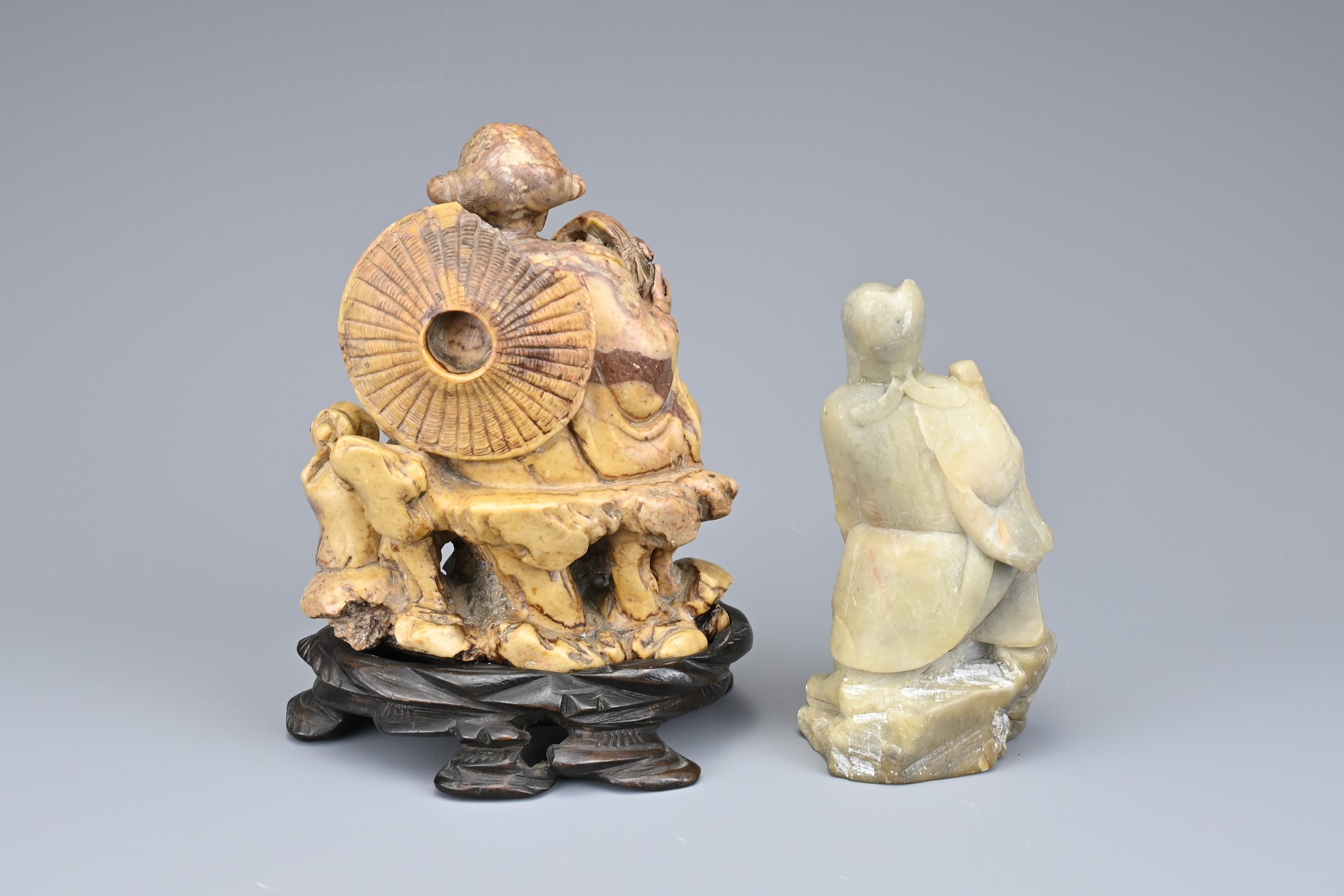 TWO CHINESE SOAPSTONE CARVINGS OF IMMORTALS, EARLY 20TH CENTURY. To include a carved figure of Lan - Image 3 of 5