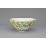 A CHINESE LIME-GREEN GROUND FAMILLE ROSE PORCELAIN OGEE FORM BOWL, 19TH CENTURY. Decorated with