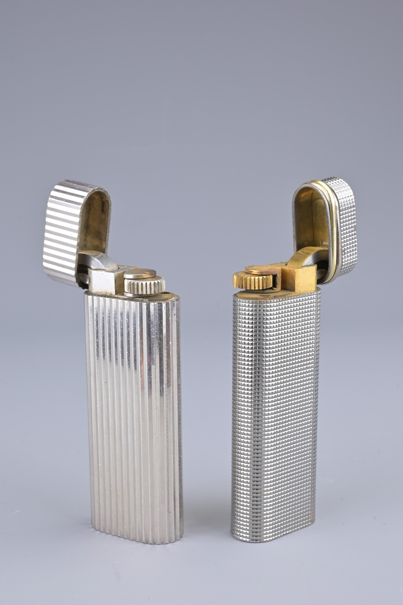 TWO VINTAGE CARTIER LIGHTERS. Marked Cartier Paris Swiss Made 99187 V and 43928 S. One with PWP - Image 2 of 4