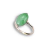 AN 18CT ROSE GOLD RING WITH GREEN STONE CABOCHON. Ring size N. Total weight 2.9 grams Good general