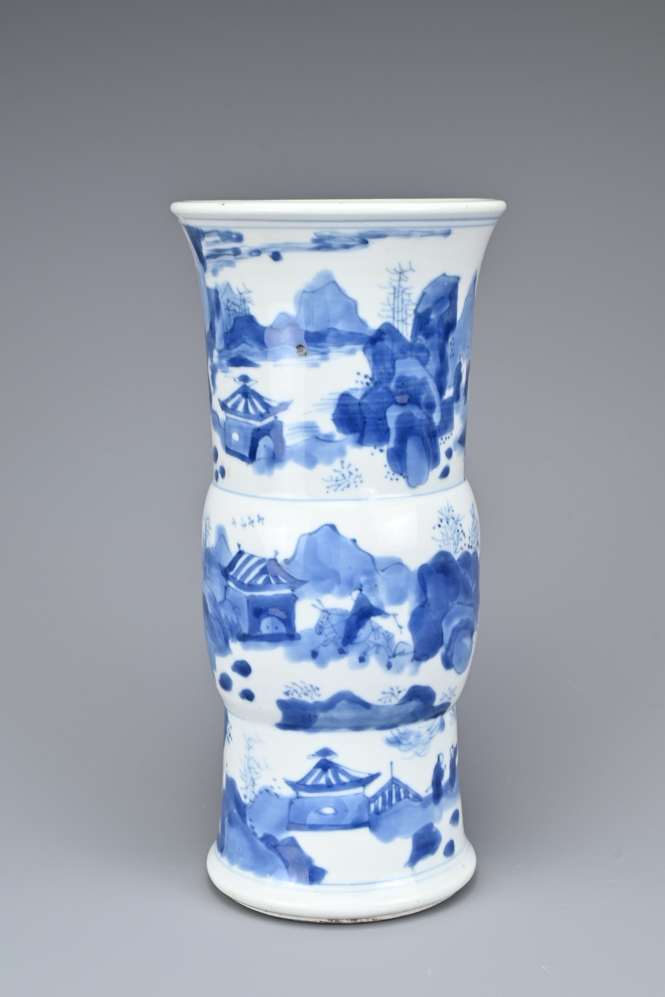 A CHINESE BLUE AND WHITE PORCELAIN GU SHAPED VASE. Fairly thickly potted, decorated with figures and - Image 2 of 7