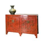 A CHINESE RED AND BLACK LACQUER ELM SIDE BOARD, SHANXI PROVINCE, 19TH CENTURY. Four-panel doors with