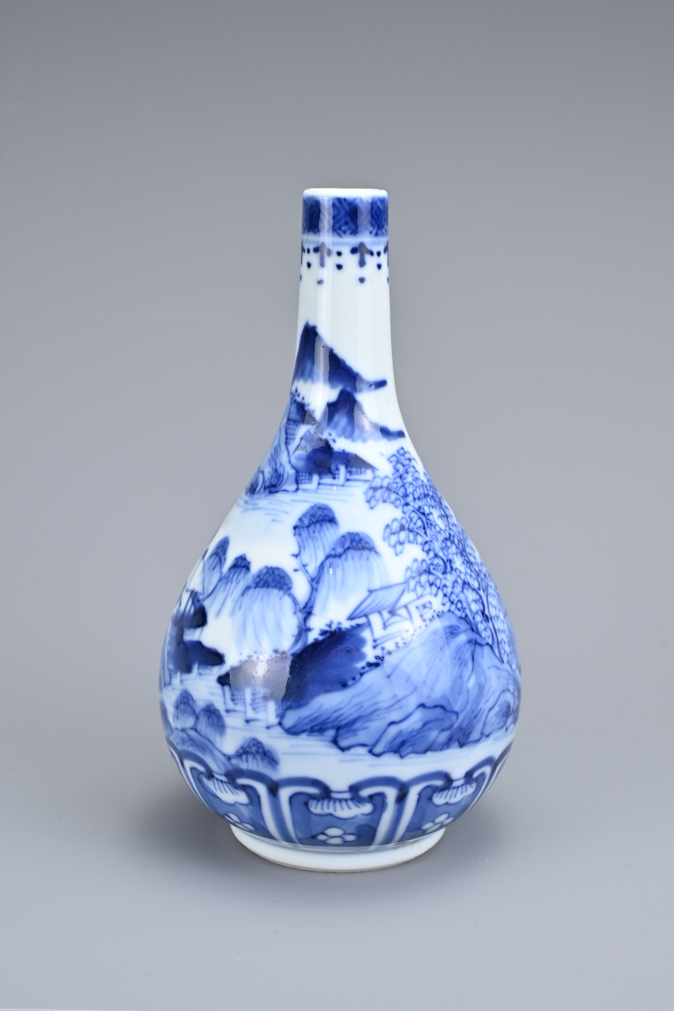 A CHINESE BLUE AND WHITE PORCELAIN BOTTLE VASE, LATE QING DYNASTY. Decorated with coastal - Image 3 of 7