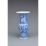 A CHINESE BLUE AND WHITE PORCELAIN GU FORM VASE, 19TH CENTURY. Decorated with continuous