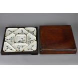 A CHINESE HARDWOOD BOXED SWEETMEAT DISH SET, EARLY 20TH CENTURY. The square form box with nine