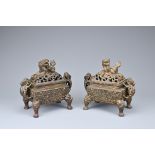 A PAIR OF CHINESE GILT BRONZE INCENSE BURNERS. Each or rectangular form with animal form handles and
