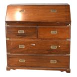 AN ANTIQUE ANGLO INDIAN CAMPAIGN BUREAU, CIRCA 1900. The two sectioned hardwood writing desk with