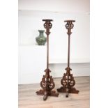 A PAIR OF CHINESE HEAVY HARDWOOD LANTERN STANDS, 19/EARLY 20TH CENTURY. A hexagonal platform on a