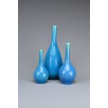 GROUP OF THREE CHINESE / JAPANESE TURQUOISE GLAZED PORCELAIN BOTTLE VASES, 19/20TH CENTURY. Each