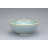 A CHINESE JUN YAO TYPE BOWL. With rounded sides covered in a bluish tone leaving the foot